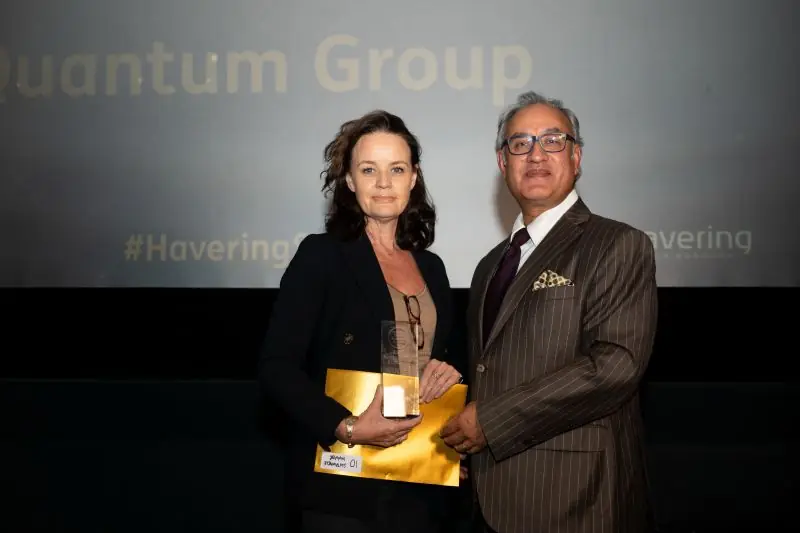 CEME's Noorzaman Rashid presents Quantum Group's Maria Gonella with their award.
