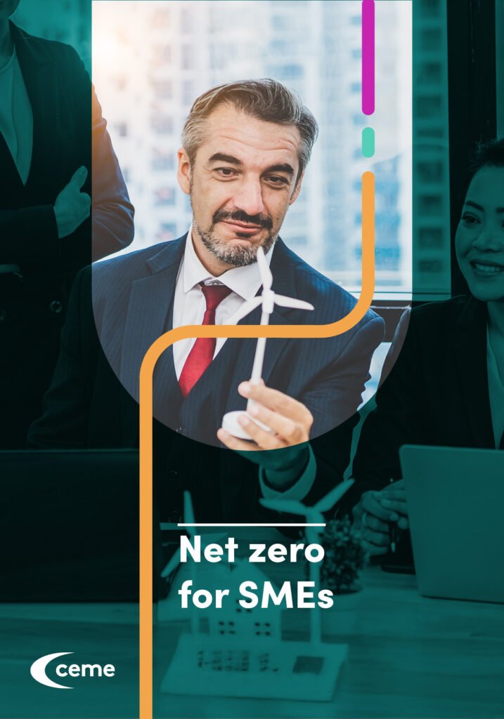 Document cover, Net Zero For SMEs. A man holds a model of a wind turbine.